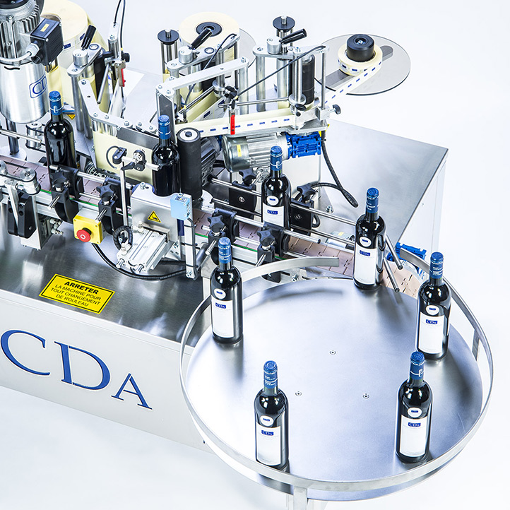 étiquetage et sertissage bouteille gamme r1000 r1500 cda usa